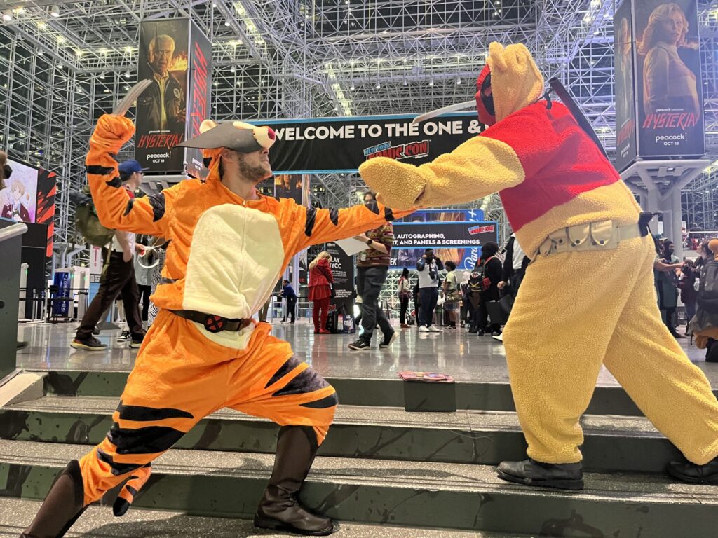 It's a cosplay battle as Wolverine Tigger faces off against Deadpool Pooh. Photo by Chris Barry.