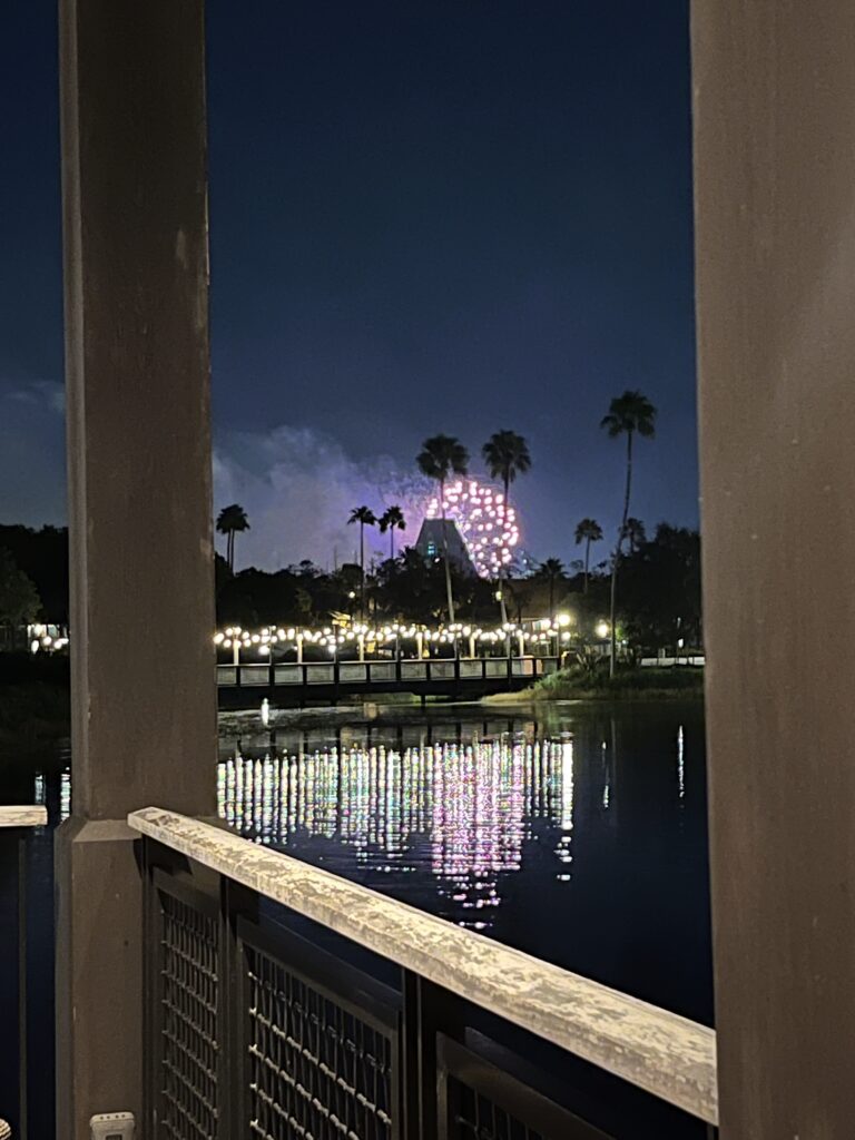 Sit back, have some great food and drink, and watch the Epcot fireworks going off over the Walt Disney World Dolphin. Photo by Chris Barry.