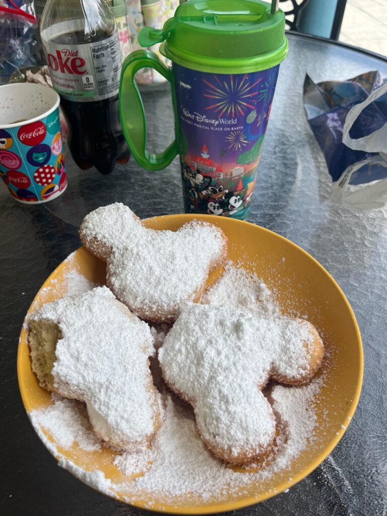 The Mickey beignets from Scat Cat's Club—Cafe in Port Orleans French Quarter Resort are incredible, but so are the lines to get them. Photo by Chris Barry.